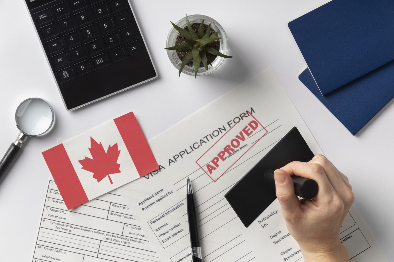 visa-application-composition-with-canadian-flag-1536x1024